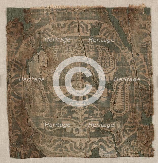 Roundel with angular palmette tree, from a tunic, 650-850. Creator: Unknown.