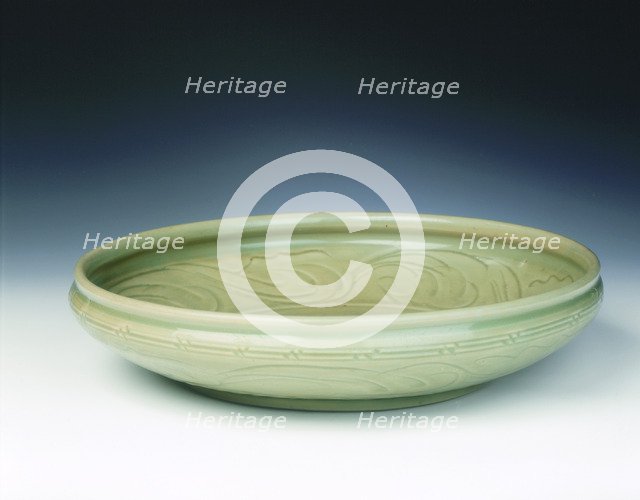 Celadon dish with moulded tree and incised scrolls, Yuan-Ming dynasty, China, 14th century. Artist: Unknown
