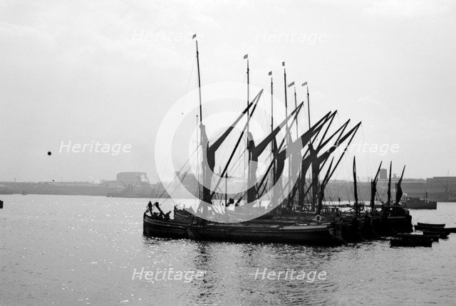Thames barges on the River Thames at Woolwich, London, c1945-c1965. Artist: SW Rawlings
