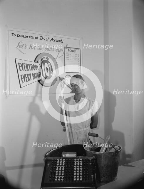 Government charwoman who provides for a family of six on her salary..., Washington, D.C., 1942. Creator: Gordon Parks.