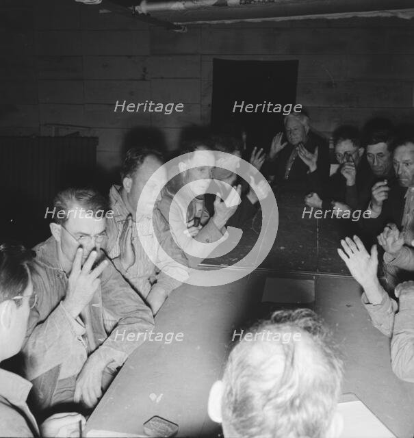 Meeting of the camp council, FSA camp, Farmersville, California, 1939. Creator: Dorothea Lange.