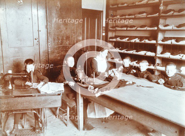 Boys sewing at the Boys Home Industrial School, London, 1900. Artist: Unknown.