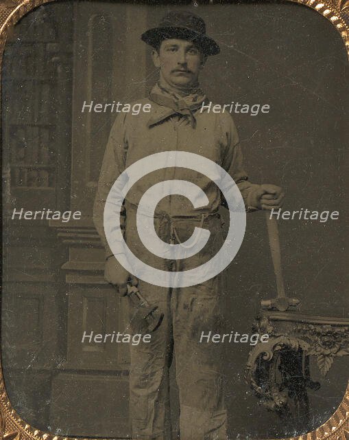 Workman Holding a Wrench and Hammer, 1860s. Creator: Unknown.