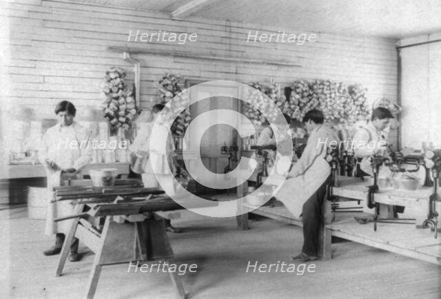 Five boys making tin utensils, Carlisle Indian School, Carlisle, Pennsylvania, 1901. Creator: Frances Benjamin Johnston.