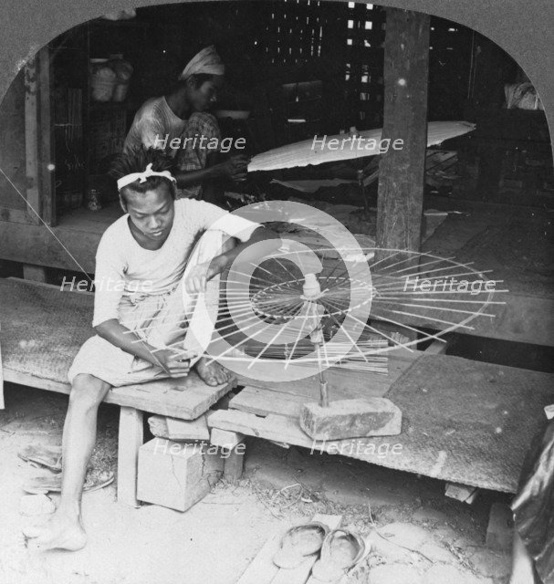 Boys making the native umbrella, Burma, 1908. Artist: Stereo Travel Co