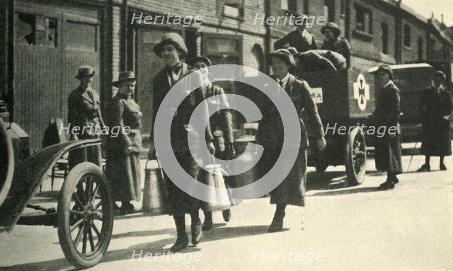 Women reservists delivering milk to a hospital, First World War, c1914-1918, (c1920). Creator: Unknown.