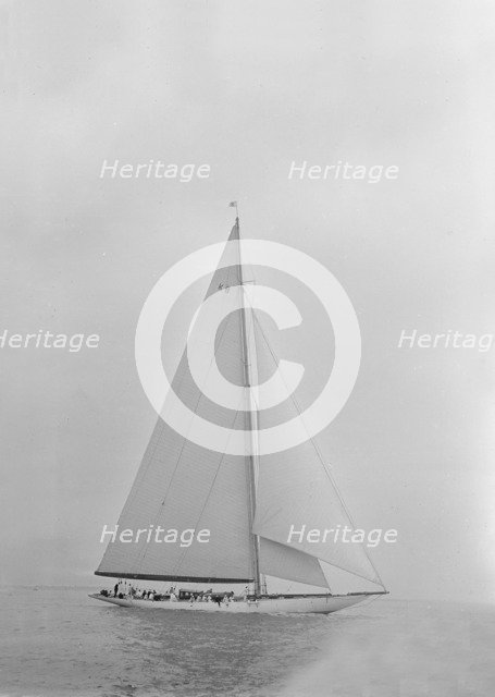 The 23 Metre 'Candida' sailing close-hauled, 1935. Creator: Kirk & Sons of Cowes.