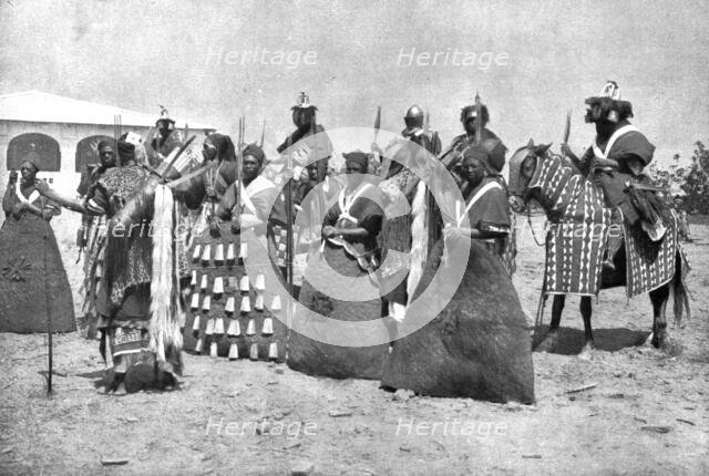 Distant Fronts, In Cameroon; Escort of the lamido of Rey Bouba,..., 191 Creator: Unknown.
