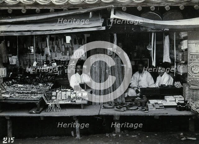 Two shops or market stalls, in Korea, c1900. Creator: Unknown.
