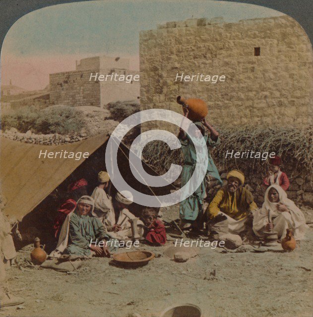There's no place like home! - dwelling and shop of a Gypsy Blacksmith, Syria, 1900. Artists: Elmer Underwood, Bert Elias Underwood.