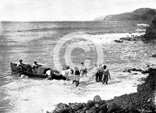 The Island of Montserrat (West Indies) - coast of Montserrat - boat taking lime juice to ship, 1895. Creator: Unknown.