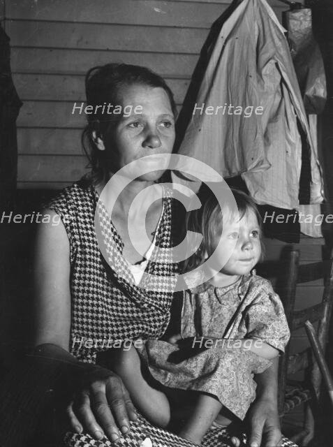 Mother and child, FSA camp, Farmersville, Tulare County, California, 1939. Creator: Dorothea Lange.