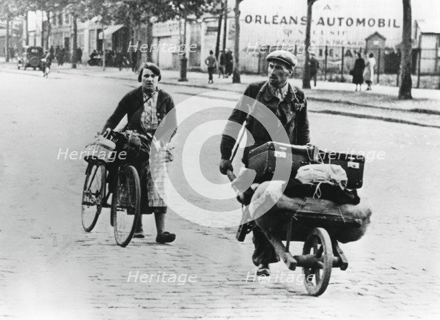 French refugees returning home after the fall of France to the Germans, Paris, July 1940. Artist: Unknown