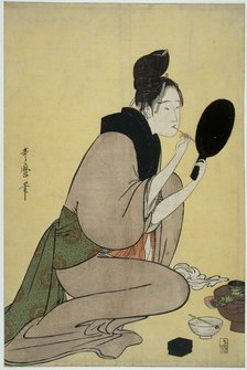 Bijin-ga. Girl applying makeup to her lips. Artist: Utamaro, Kitagawa (1753-1806)