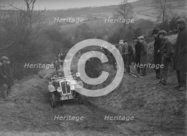 Austin 7 Grasshopper of WH Scriven competing in the MG Car Club Midland Centre Trial, 1938. Artist: Bill Brunell.