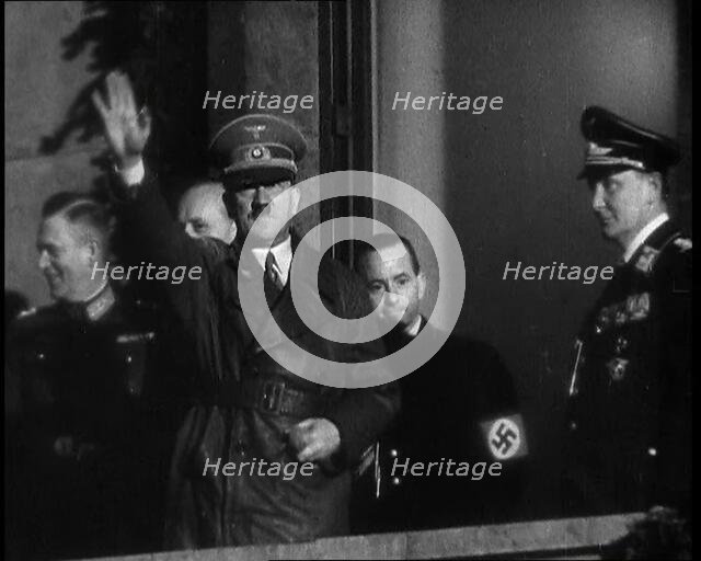 Adolf Hitler, the German Leader, Saluting the Crowd with Hermann Goering and..., 1937. Creator: British Pathe Ltd.