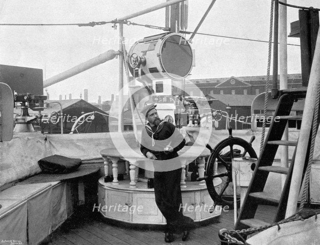 A holophote on board HMS 'Imperieuse', 1896. Artist: A Debenham