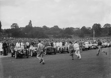 Drivers running to their cars at the start of a race at Crystal Palace, London, 1939. Artist: Bill Brunell.