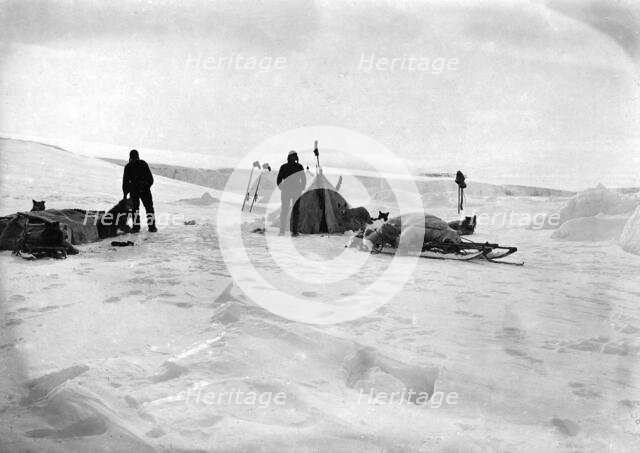 Members of a Sled Expedition near Their Tent, 1913. Creator: Mikhail Alekseevich Pavlov.