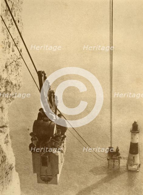 'The Lighthouse Builders', c1930. Creator: J. Weston & Son.