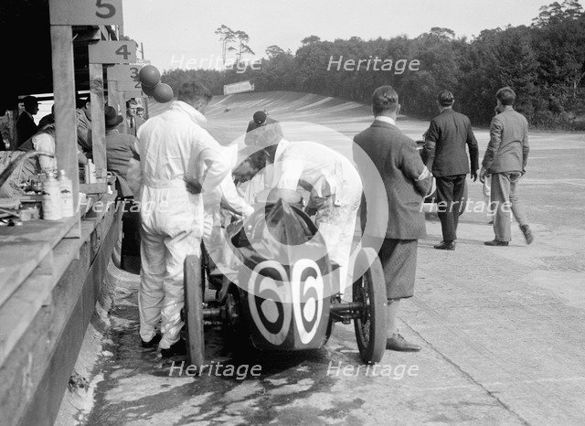 Austin 747 cc car of Charles Goodacre retired from the BRDC 500 Miles Race, Brooklands, 1931. Artist: Bill Brunell.