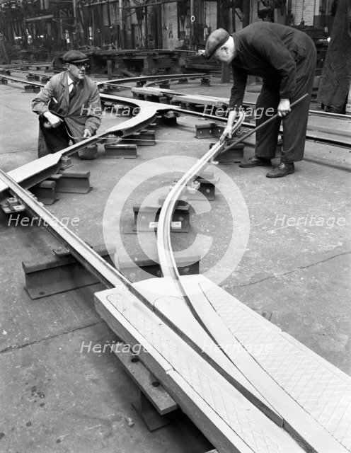 Assembling trackwork in an ICI factory, Sheffield, South Yorkshire, 1963.  Artist: Michael Walters