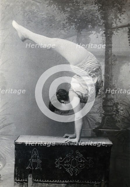 A Bulgarian female acrobat standing on her hands, early 20th century. Creator: Unknown.