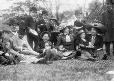 Midgets May Party - Central Park. Group seated on grass, 1910. Creator: Bain News Service.
