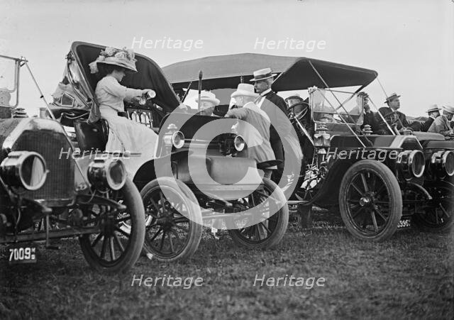 Wright Flights, Fort Myer, Va, July 1909. Spectators: Mrs. Longworth; Sec. Knox..., Sec. Nagle. Creator: Harris & Ewing.