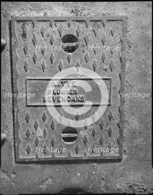 Iron drain cover in the cellar, Broughton House, London Road, Dunton Green, Kent, 1990. Artist: Peter Williams.