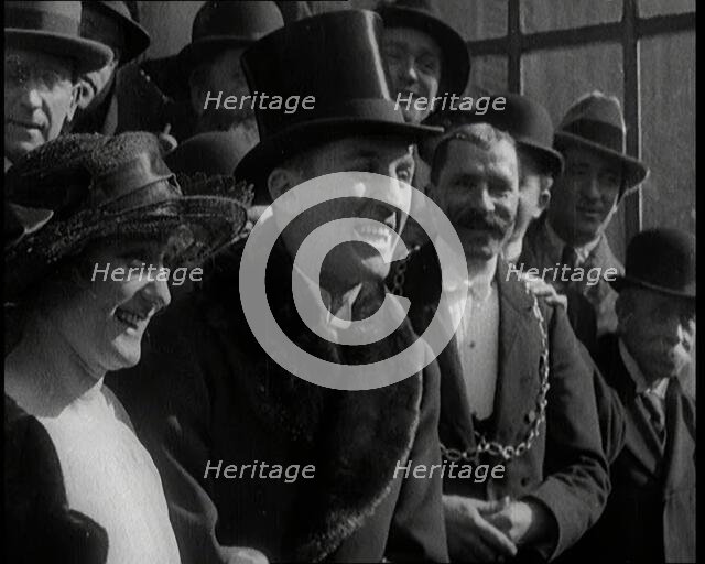 Newlywed Beatrice Lillie Smiling for Cameras With Boxer Georges Carpentier, 1920. Creator: British Pathe Ltd.