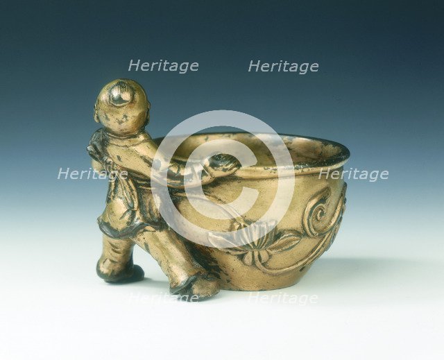 Gilt bronze water container with boy holding the rim, Ming dynasty, China, c early 16th century. Artist: Unknown