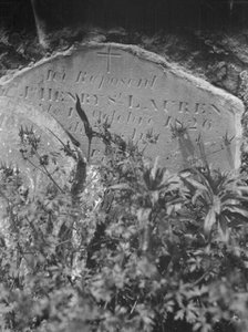 Tombstone in St. Louis Cemetery, New Orleans, between 1920 and 1926. Creator: Arnold Genthe.