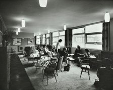 Abbey Wood County High School, Woolwich, London: teachers relaxing in the staff room, 1962. Creator: Unknown.
