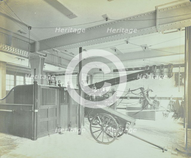 Interior of appliance room, Northcote Road Fire Station, Battersea, London, 1906. Artist: Unknown.