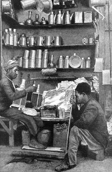 Tinsmiths in a tinsmith's shop, India, 1922.Artist: R Gorbold