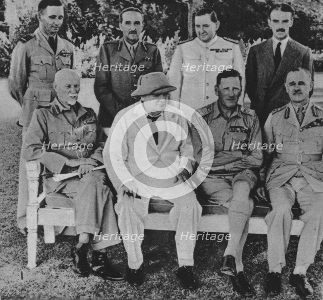 'At the Front in Egypt: Mr. Churchill in Cairo with members of the Middle East War Council', 1942. Artist: Unknown.