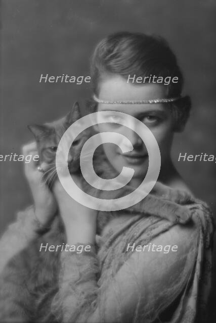 Holch, Anna, Miss, with Buzzer the cat, portrait photograph, ca. 1913. Creator: Arnold Genthe.