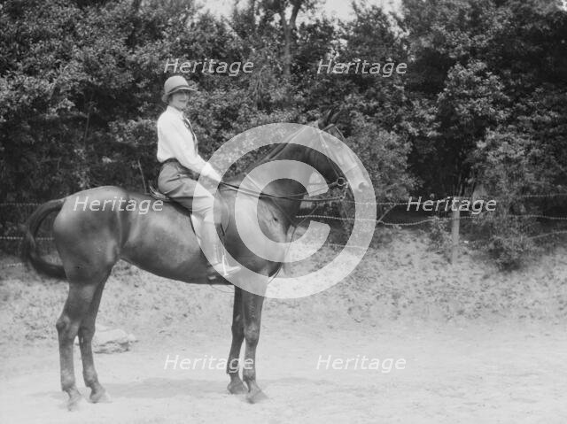 McCulloch, Mrs., daughter of, on horseback, 1929 June 13. Creator: Arnold Genthe.
