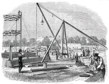 The Great Exhibition Building in Hyde Park - Unloading Girders, 1850. Creator: Unknown.