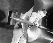 Richard Whitcomb with Area Rule Wind Tunnel Model, USA, April 20, 1955.  Creator: Unknown.