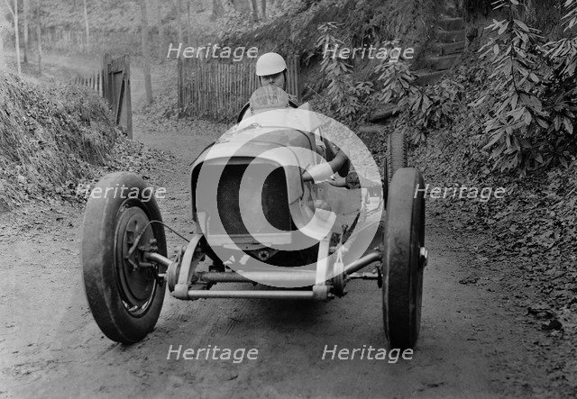 Charles Mortimer driving an offset-bodied single-seater MG KN Special, c1930s Artist: Bill Brunell.
