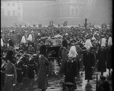 Crowd Watching the Funeral Procession of George V, His Majesty The King, 1936. Creator: British Pathe Ltd.