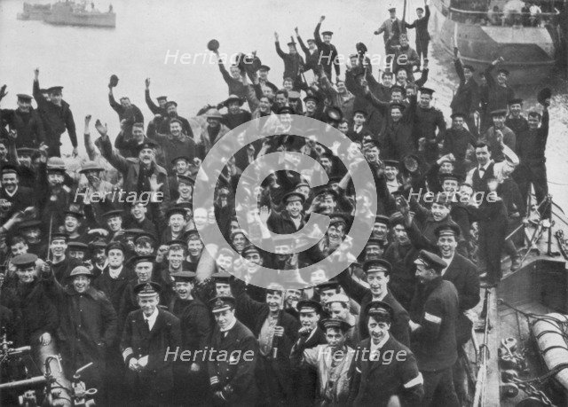 The crew of HMS 'Vindictive' celebrating the Zeebrugge Raid on 23 April 1918. Artist: Unknown