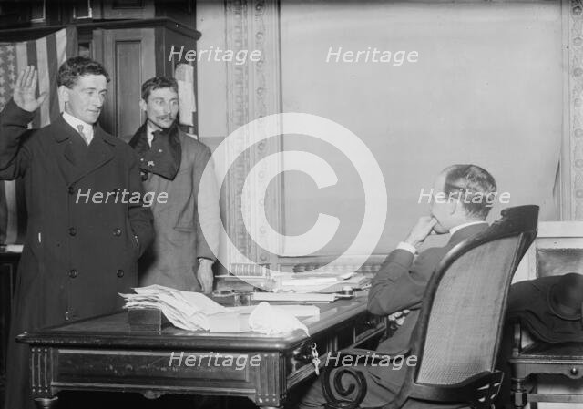 Judge in chambers swearing in a new citizen, New York, 1910. Creator: Bain News Service.
