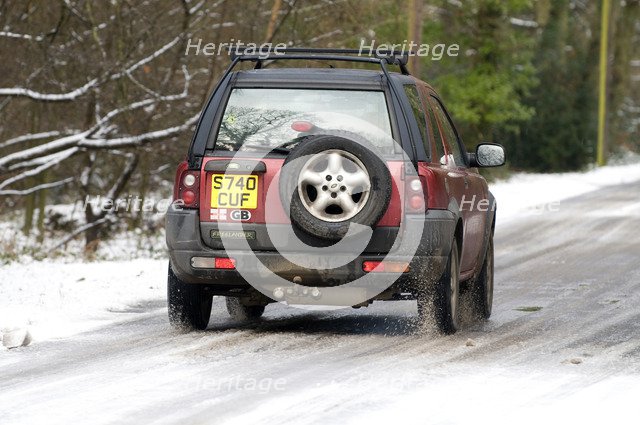 1998 Land Rover Freelander driving on icy road 2009 Artist: Unknown.