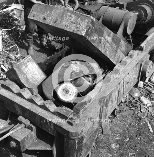 Linderman box baler crushing scrap, Rotherham, South Yorkshire, 1963.  Artist: Michael Walters