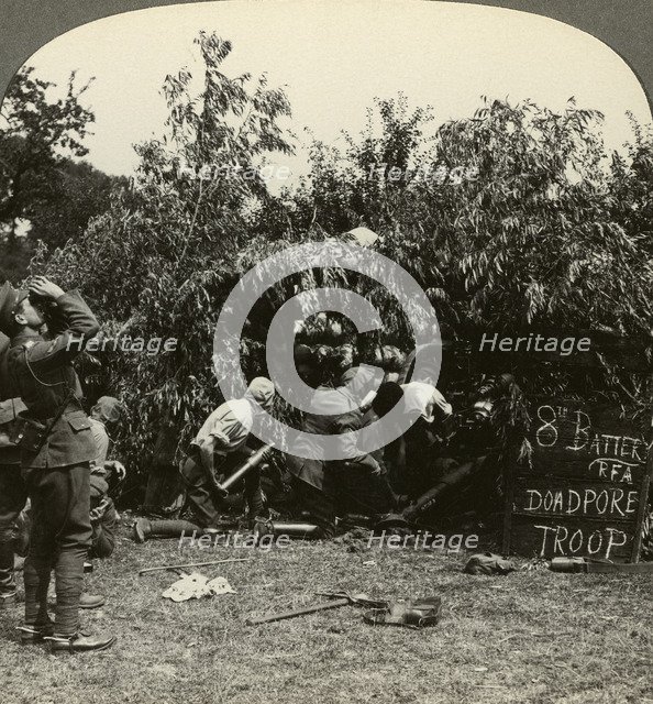 Gunners wearing gas masks, World War I, 1914-1918.Artist: Realistic Travels Publishers