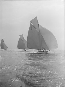 'The Truant' and 'Antwerpia IV' racing with spinnakers, 27th May 1912. Creator: Kirk & Sons of Cowes.