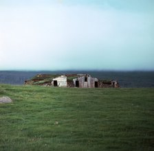 Old Viking-style Icelandic turf farm. Artist: Unknown